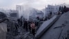 Palestinians gather at the site of an Israeli strike on houses in Gaza City on Jan. 4, 2025.