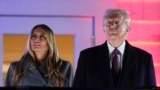 President-elect Donald Trump and Melania Trump watch fireworks at Trump National Golf Club in Sterling, Va., Jan. 18, 2025, ahead of the 60th Presidential Inauguration. 