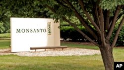 FILE - This June 29, 2006, photo shows a sign at the Monsanto Co. headquarters in St. Louis.