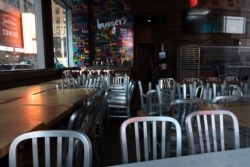 The Counter restaurant is closed for indoor dining, Dec. 15, 2020, in New York. A ban on indoor dining at New York City restaurants was enacted by officials trying to slow the resurgence of the coronavirus.