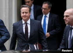 FILE - British Prime Minister David Cameron said Sept. 27, 2015, Syrian President Bashar al-Assad could stay on as part of a transitional government but shouldn't be part of a long-term solution, Sept. 7, 2015.