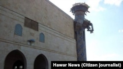 A mosque in the Kurdish town of Tall Maruf, Syria, destroyed in Syria. 