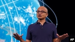 FILE - Microsoft CEO Satya Nadella delivers the keynote address at Build, the company's annual conference for software developers, in Seattle, May 6, 2019.