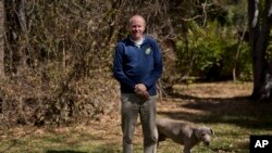 David Coltart, a Zimbabwean opposition member and human rights lawyer poses for a portrait in the garden of his residence in Bulawayo, Zimbabwe, July 22, 2018.