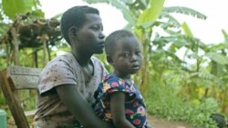 A 2003 photo of Pascazia Mukamana of southwestern Rwanda, who quit school to raise her three siblings after their mother died from AIDS