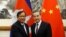 FILE - Cambodian Foreign Minister Prak Sokhonn and Chinese Foreign Minister Wang Yi pose for photos at Diaoyutai state guesthouse in Beijing, China May 31, 2019. (REUTERS/Florence Lo/Pool)