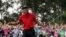 Tiger Woods reacts as he wins the Masters golf tournament Sunday, April 14, 2019, in Augusta, Ga.