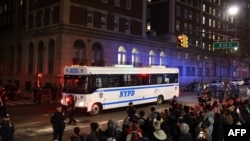 A NYPD bus carries arrested students at Columbia University in New York City on April 30, 2024.