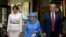 Britain's Queen Elizabeth stands with U.S. President Donald Trump and his wife, Melania