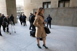 Donna Rotunno walks ahead of her client Harvey Weinstein, left, as they arrive at a Manhattan courthouse to attend jury selection for his trial on rape and sexual assault charges in New York, Jan. 17, 2020.