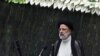 Presiden Iran Ebrahim Raisi berpidato setelah mengucap sumpah jabatan dalam upacara pelantikan di Parlemen di Teheran, Iran, Kamis, 5 Agustus 2021. 