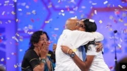 Snigdha Nandipati celebrates her spelling bee victory with her grandparents, Mallikarjunarao and Rajeswari Chalavadi