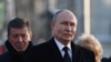 Russian President Vladimir Putin takes part in a flower laying ceremony at the monument to the first mayor of Saint Petersburg, Anatoly Sobchak, in Saint Petersburg, Feb. 19, 2025. (Sputnik/Alexander Kazakov/Pool via Reuters)