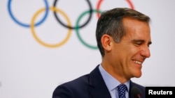 FILE - Mayor of Los Angeles Eric Garcetti attends the briefing of 2024 Olympic Games candidate cities Paris and Los Angeles ahead of final election of 2024 Olympic host city, in Lausanne, Switzerland, July 11, 2017. 