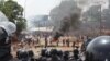 FILE - Opposition protestors clash with police in Conakry, Guinea, May 2013.