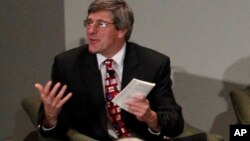 FILE - Economic commentator Stephen Moore leads a panel discussion at the Federal Reserve Bank of Dallas, in Dallas, Texas, Dec. 4, 2012.