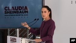 ARCHIVO - La futura presidenta de México, Claudia Sheinbaum, habla durante una conferencia de prensa en la Ciudad de México, el martes 11 de junio de 2024.