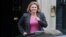 British politician Justine Greening leaves No. 10 Downing Street in central London on Sept. 4, 2012.