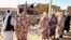 File - People pray for the victims of a drone strike in El Obeid, North Kordofan State, Sudan, January 12, 2026.