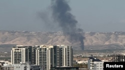 Dîmena êrîşeke 12'ê Adarê li Hewlêrê.