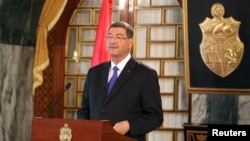 Tunisia's Prime Minister-designate Habib Essid speaks during a news conference in Tunis, Feb. 2, 2015. 
