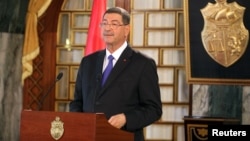 Tunisia's Prime Minister-designate Habib Essid speaks during a news conference in Tunis, Feb. 2, 2015. 