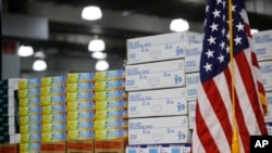 FILE - In this March 24, 2020, file photo stacks of medical supplies are housed at the Jacob Javits Center that will become a temporary hospital in response to the COVID-19 outbreak in New York.
