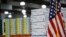 FILE - In this March 24, 2020, file photo stacks of medical supplies are housed at the Jacob Javits Center that will become a temporary hospital in response to the COVID-19 outbreak in New York.