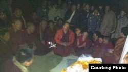 Local Tibetans gathered to pray for Kalsang Kyab after he self-immolated Tuesday.