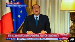 Italian media mogul and former prime minister Silvio Berlusconi comments on the supreme court decision that confirmed his jail sentence for tax fraud, August 1, 2013.