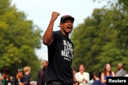 Marques Armstrong chants in support of Philando Castile, who was fatally shot by Minneapolis area police during a traffic stop on Wednesday, at a "Black Lives Matter" demonstration, in front of the Governor's Mansion in St. Paul, Minnesota. (Reuters)