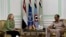 U.S. Secretary of State Hillary Rodham Clinton, left, meets with Field Marshal Hussein Tantawi, right, at the Ministry of Defense in Cairo, Egypt, July 15, 2012.