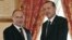 Turkish Prime Minister Recep Tayyip Erdogan, right, and Russian President Vladimir Putin shake hands at their meeting in Istanbul, Turkey, Monday, Dec. 3, 2012. 