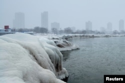 The city skyline is seen from the North Avenue Beach at Lake Michigan, as bitter cold phenomenon called the polar vortex has descended on much of the central and eastern United States, in Chicago, Illinois, U.S., January 29, 2019.