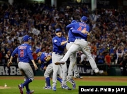 The Chicago Cubs celebrate after Game 7 of the Major League Baseball World Series against the Cleveland Indians.