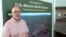 Kenneth Madsen, an Ohio State University-Newark geography professor and border wall expert, discusses his photo exhibit of border wall pictures and maps, "Up Close with U.S.-Mexico Border Barriers," in Newark, Ohio, Sept. 14, 2018.