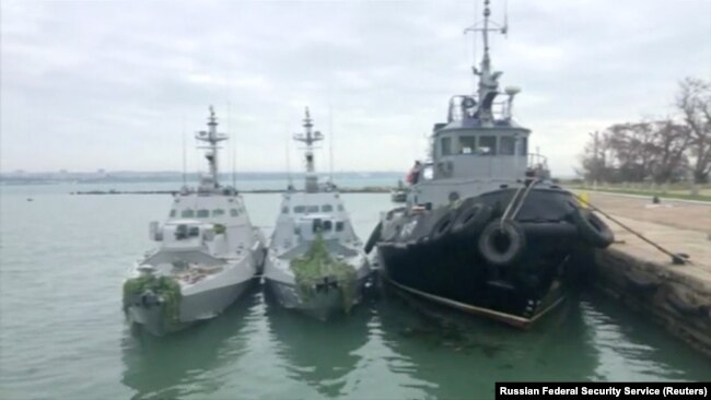 Ukrainian naval ships seized by Russia are seen docked in Kerch, in Russia-annexed Crimea, in this image from video released by Russia's Federal Security Service, Nov. 27, 2018.