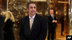 FILE - Michael Cohen, an attorney for President-elect Donald Trump, arrives in Trump Tower in New York.