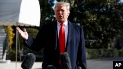 President Donald Trump talks with reporters before traveling to the G20 Summit in Buenos Aires, on the South Lawn of the White House, Nov. 29, 2018, in Washington. 