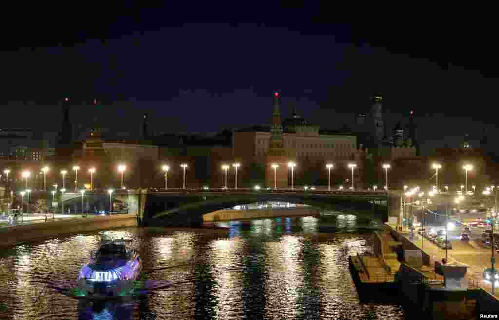 The Kremlin is seen after the lights are switched off for Earth Hour in Moscow, March 30, 2019. 