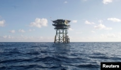 FILE - A Vietnamese floating guard station is seen on Truong Sa islands or Spratly islands, April 12, 2010.