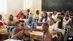 FILE—Mouhamed Sall, who is deaf, communicates using sign language at the Guinaw Rail Sud public high school in Pikine, Senegal, March 18, 2024.