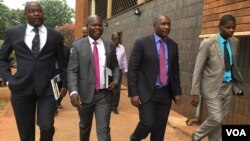 Supa Mandiwanzira appearing before a local magistrate in Harare.