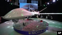 (FILE) Iran's domestically built drone, Mohajer-10, is displayed in an exhibition in a military compound belonging to the Defense Ministry, in Tehran, Iran, Wednesday, Aug. 23, 2023.