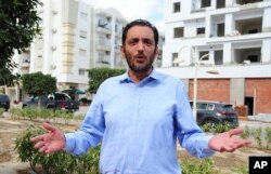 FILE - Yassine Ayari reacts during an interview in Tunis, Tunisia, Oct.12, 2021.