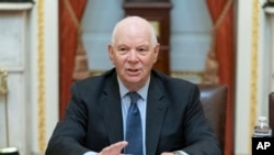FILE - U.S. Sen. Ben Cardin talks to reporters about assuming chairmanship of the Senate Foreign Relations Committee at the Capitol in Washington, Sept. 28, 2023. 