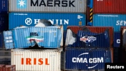 FILE - Empty and disused Islamic Republic of Iran Shipping Lines (IRISL Group) containers are seen at Malta Freeport in the Port of Marsaxlokk outside Valletta.