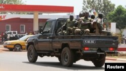 Central African Soldiers patrol a street in Bangui, Central African Republic, January 1, 2013. 