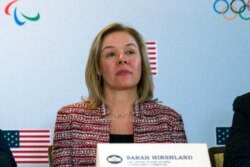 FILE - United States Olympic and Paralympic Committee CEO Sarah Hirshland listens during a briefing with the U.S. Olympic and Paralympic Committee and Los Angeles 2028 organizers in Beverly Hills, Calif., Feb. 18, 2020.