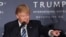 FILE - U.S. President-elect Donald Trump, still a presidential candidate at the time, speaks during the grand opening of Trump International Hotel in Washington, D.C., Oct. 26, 2016. Experts say that anything short of Trump selling off his global holdings before he assumes power would inevitably present complications during his time in office.